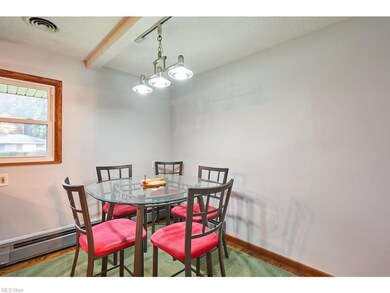 Eat in kitchen with newer light fixture