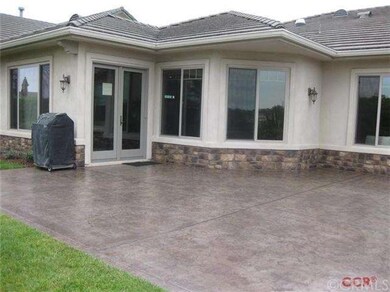 Back patio with stamped concrete.
