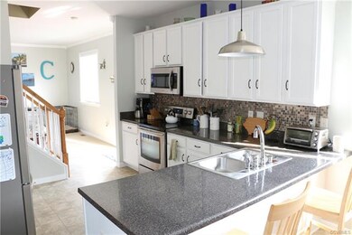 Kitchen with breakfast bar.