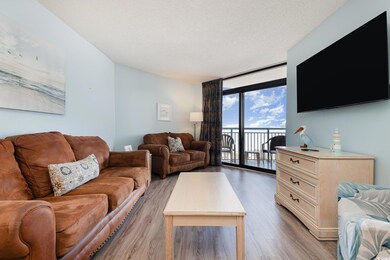 Living room featuring hardwood / wood-style floori