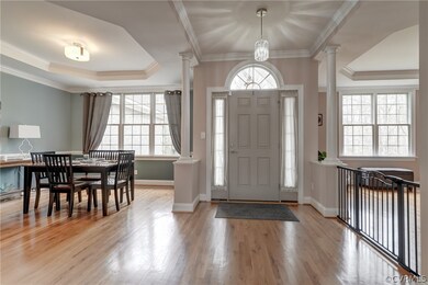 Foyer with light hardwood / wood-style flooring, c