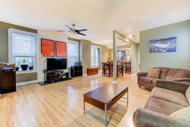 The expansive family room adjoins the formal dining area