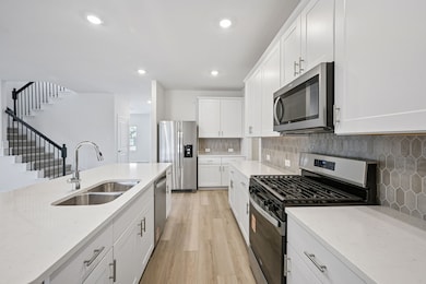 Photo is not of the actual home, but is an inspirational photo of builder’s model home and may depict options, furnishings, and/or decorator features that are not included.