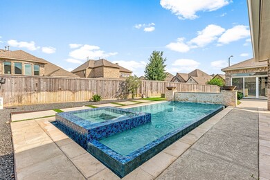 This photo showcases a modern backyard with a slee