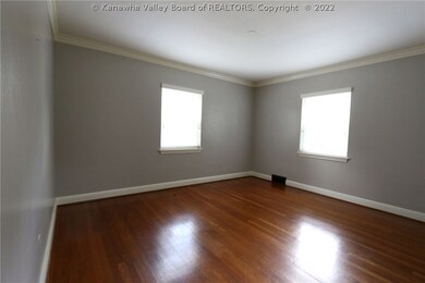 Formal Dining Room located off main hallway and ki