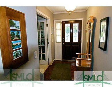 Foyer. foyer has hardwoods and lots of light
