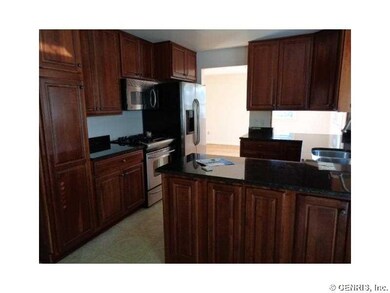 Exterior Front. Solid surface counter tops.