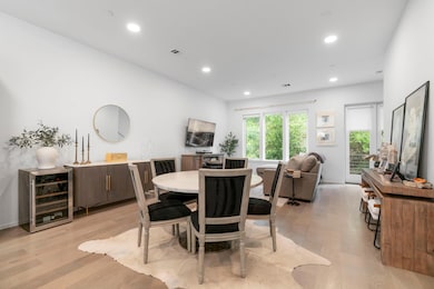 Dining area with wine cooler, plenty of natural l