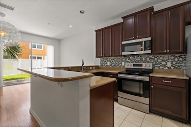 9430 Tawnyberry St, Orlando, FL 32832 - photo 7