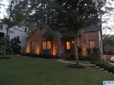 308 Ridge Road at dusk. Landscaping lighting has r