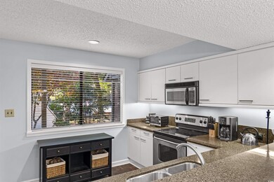 Kitchen featuring appliances with stainless steel 