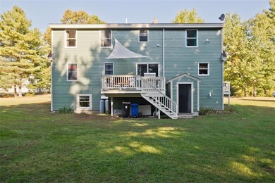 Backyard w/ attached deck