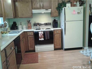 Kitchen. nice size eat in kitchen with wood floors. appliances included.
