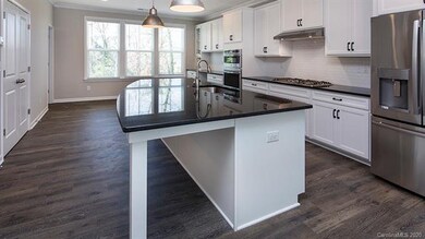 Kitchen features ample amount of cabinet storage a