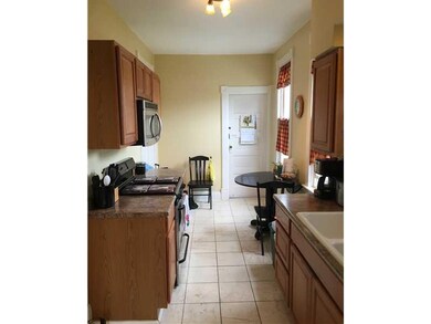 Kitchen. Adorable Kitchen that leads to the rear p