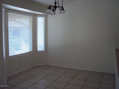 DINING ROOM WITH BAY WINDOW