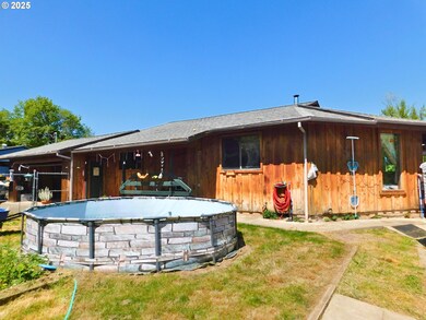 231 NE Darrell Ave, Winston, OR 97496 - photo 4