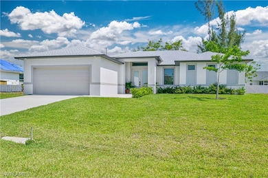 View of front of house featuring a front lawn and