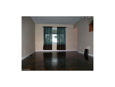 Spacious living room with refinished hardwood!