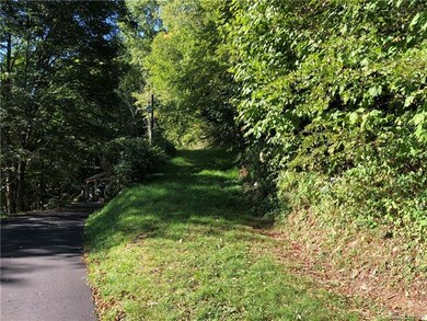 View of road and beginning of roughed in drive