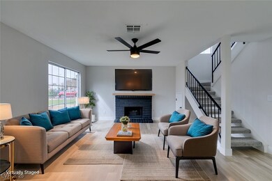 virtually Staged Living room featuring a ceiling f