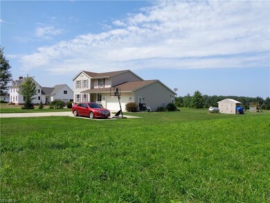 Lot is located right of this house that is at 8807