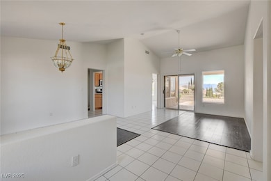 Empty room with light tile patterned flooring, a c