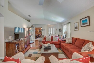 At the end of the living room, French doors welcom