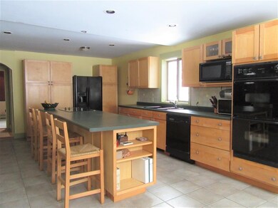 Great Maple cabinetry with large island!