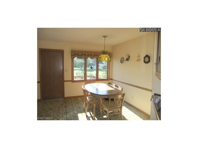 The dining area shows off a large window to let th