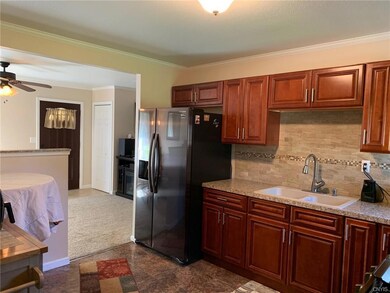 Light neutral countertops and back splash complime