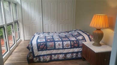 This master bedroom has lots of natural lighting.