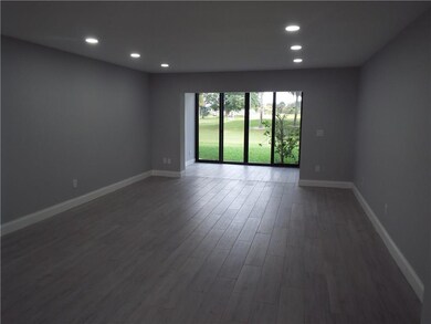 View from living room to enclosed patio
