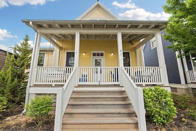 View of exterior entry with a porch