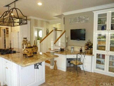 Custom panelled frig & pot rack are included.  Dis