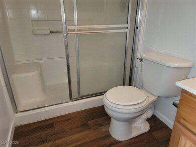 Bathroom featuring hardwood / wood-style floors, v