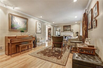 Living Room with Recessed Lighting and Wood Burnin