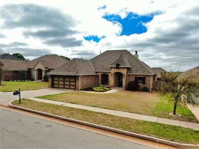 French country style house featuring a front yard 
