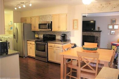Eat-in kitchen leads in to den