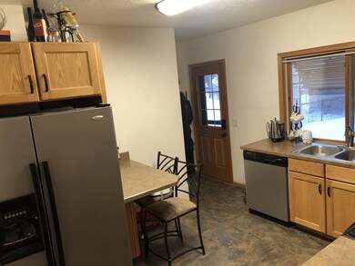 1424 5th St SW, Minot, ND 58701 - photo 3