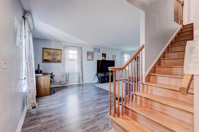 Foyer featuring hardwood / wood-style flooring