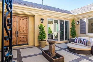 Photo of front courtyard of model home