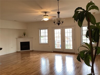 Greatroom features corner Fireplace and hardwood f