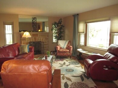 Lovely stone fireplace located in living room