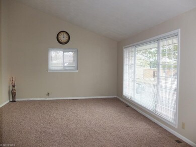 Another view of the living room with picture windo