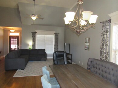 large combination living and dining room  