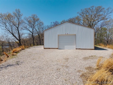 Front door is 12' x 10' with a door opener.
