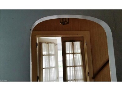 Lovely arch detail to stairs and sunporch