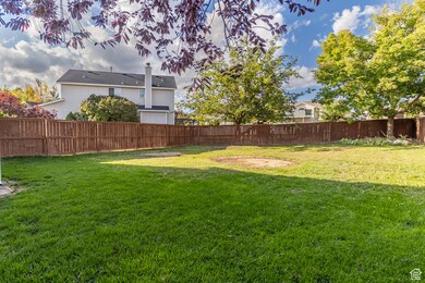 View of fenced backyard
