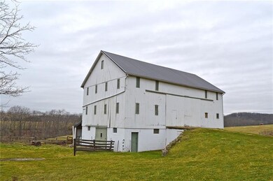 Roofs on Barns and House Have Been Updated!